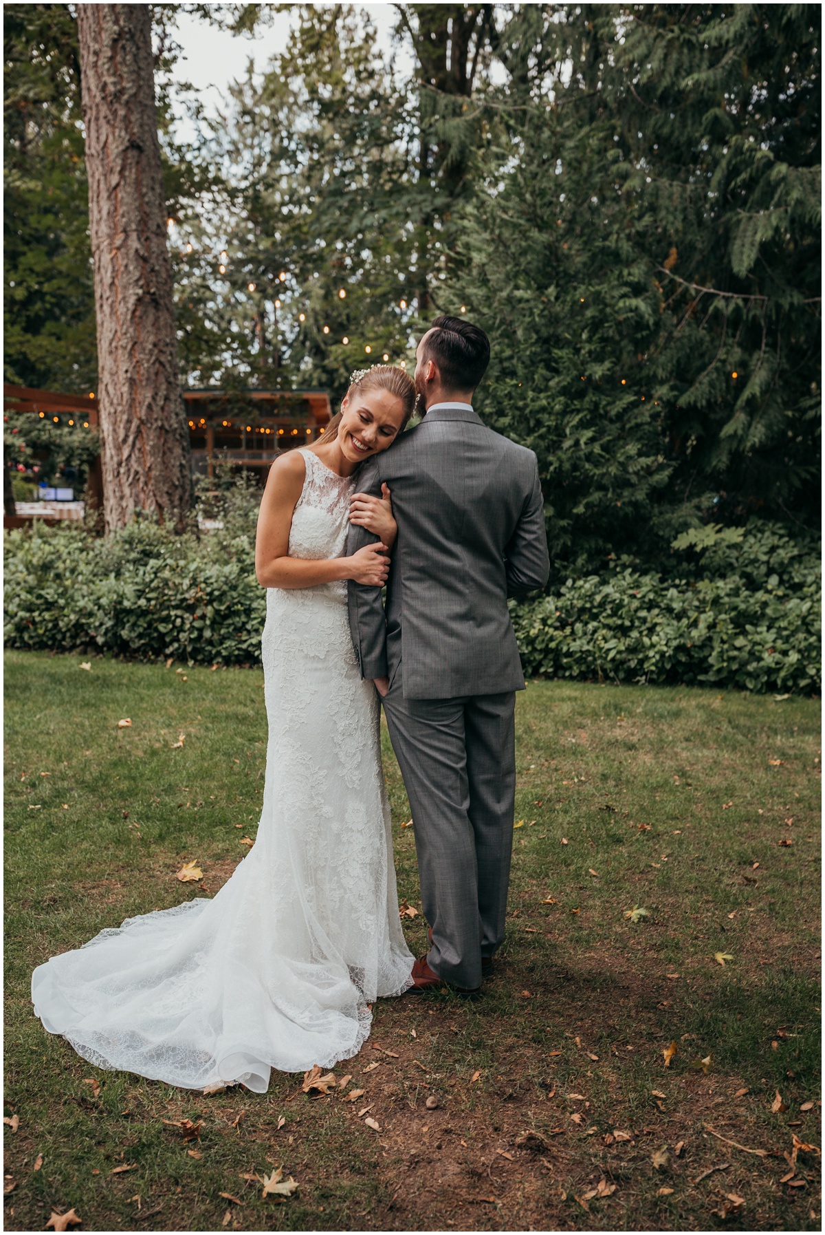 bride rests head on shoulder of groom | glenwood treefarm tacoma washington photographer