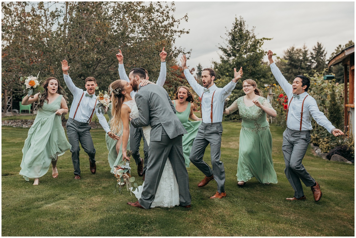 bride and groom with wedding party excited | glenwood treefarm tacoma washington photographer