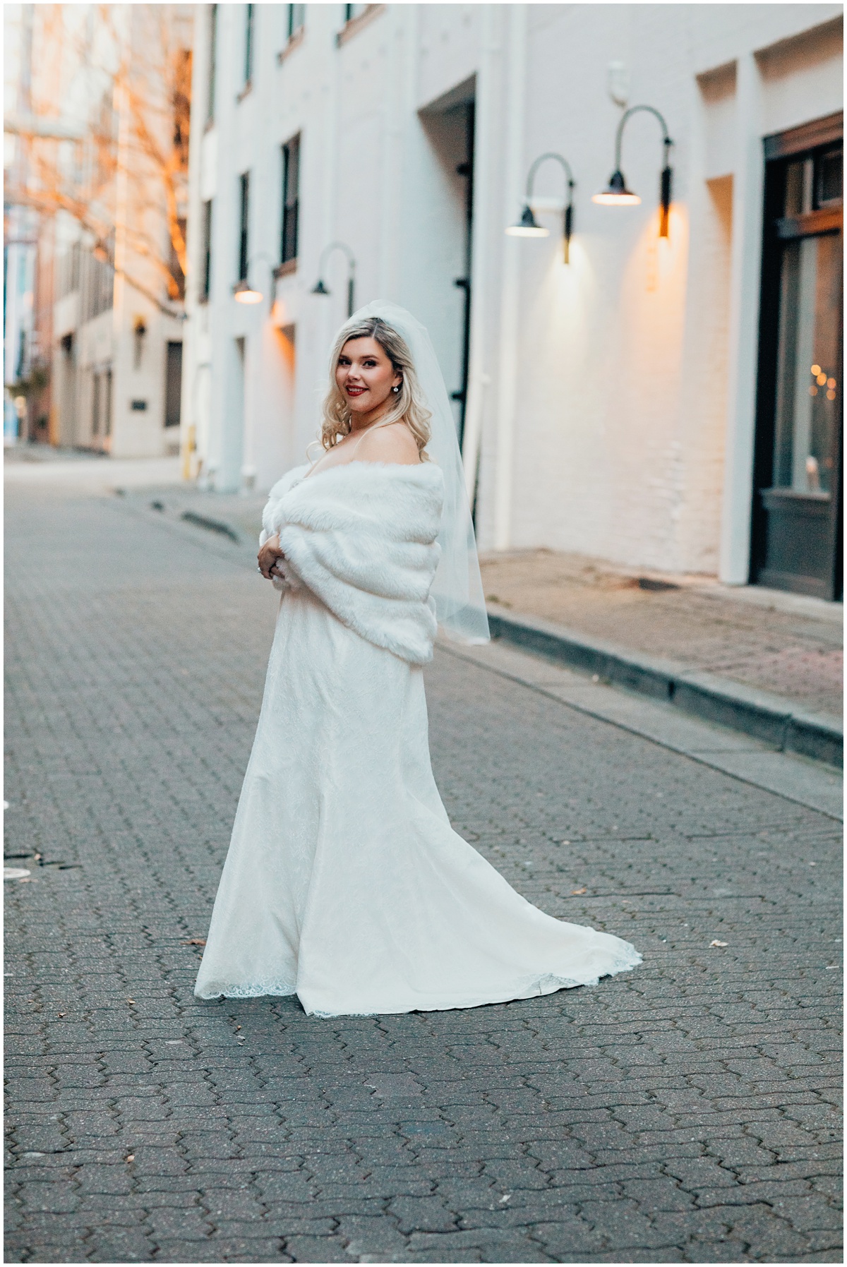 bride standing in alley