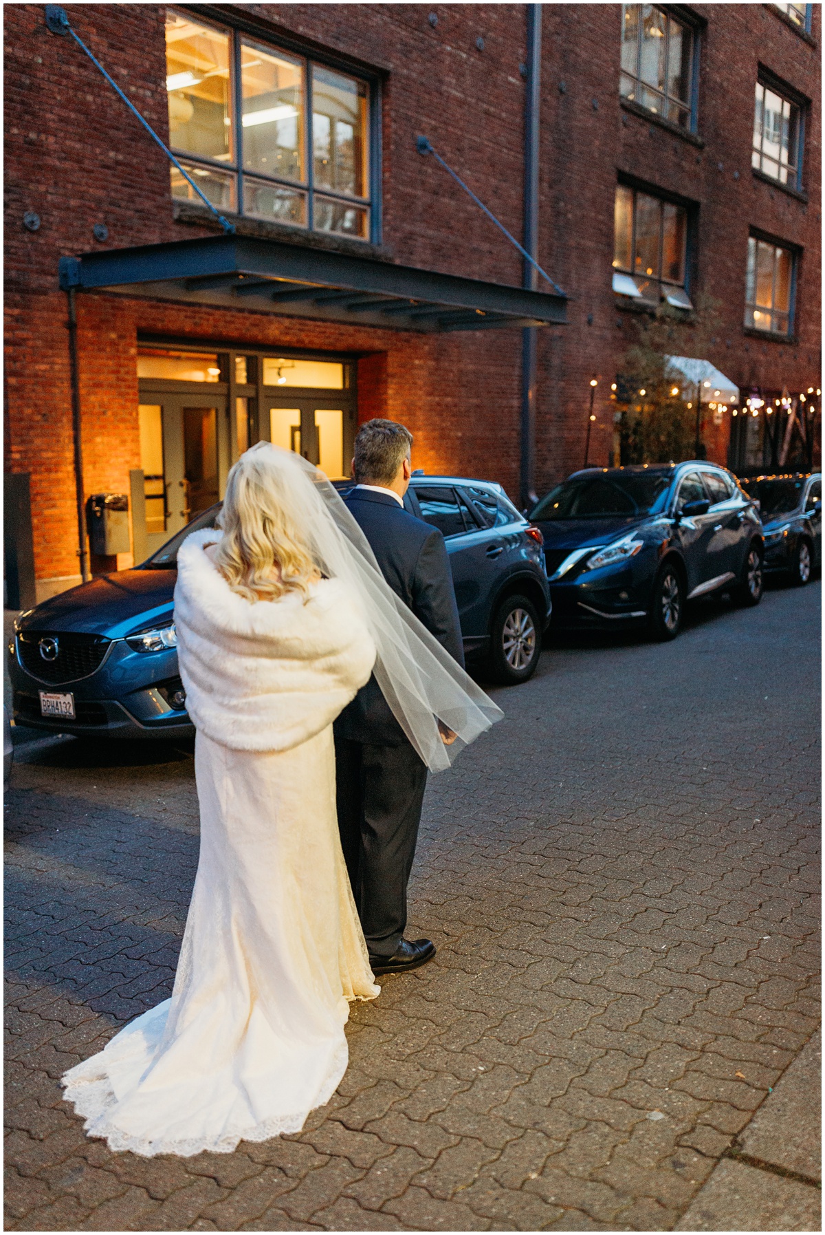 first look of bride and groom on street