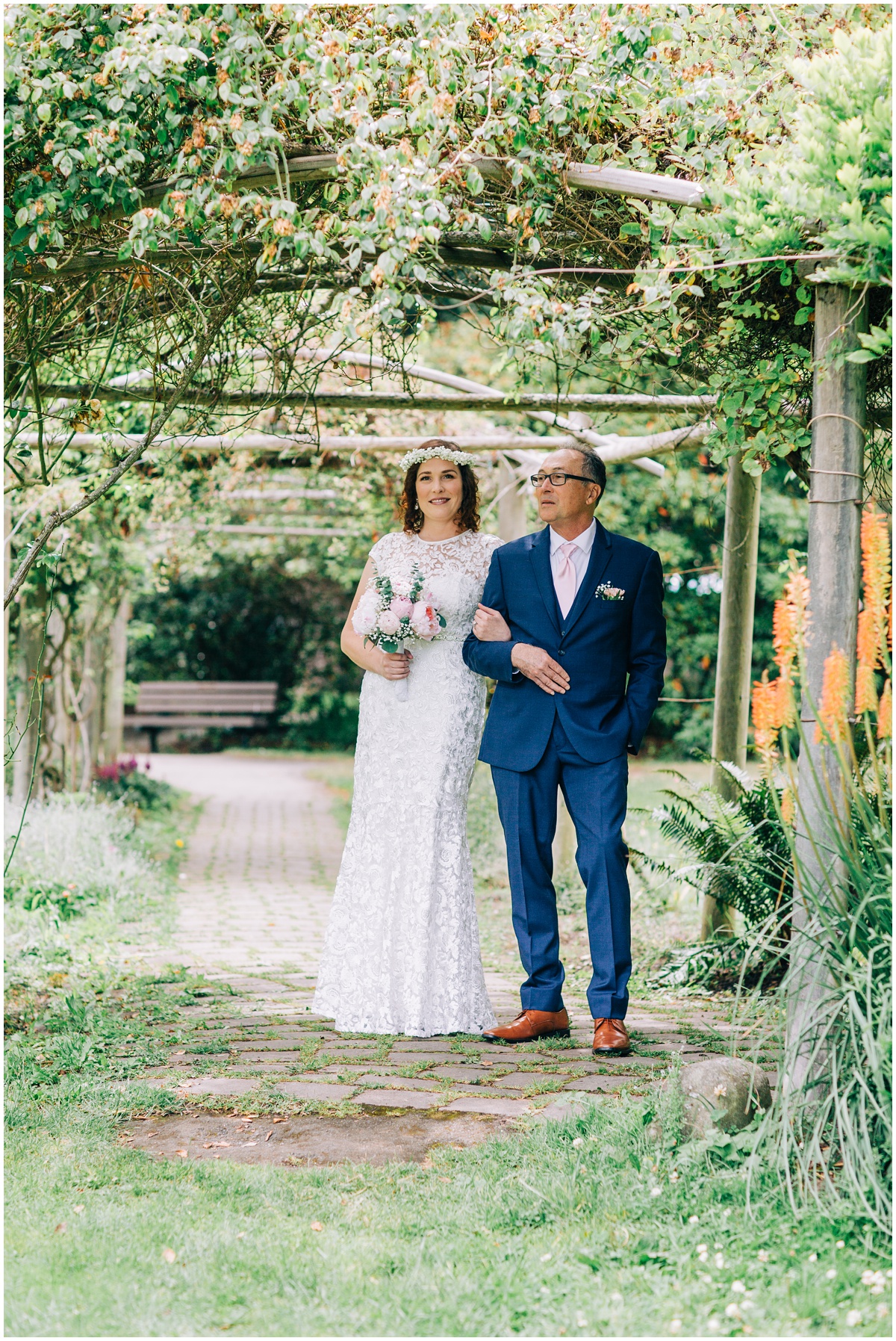 bride and father walk down the aisle 
