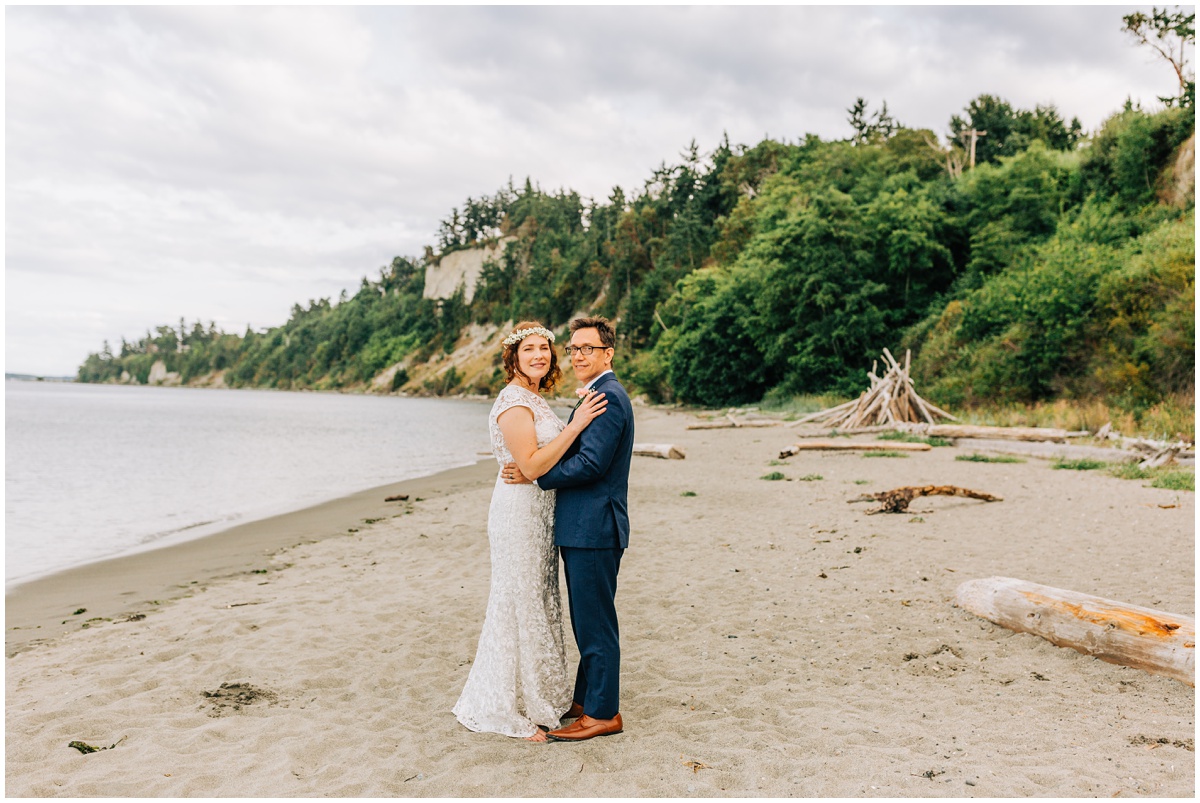 portrait of bride and groom on beach