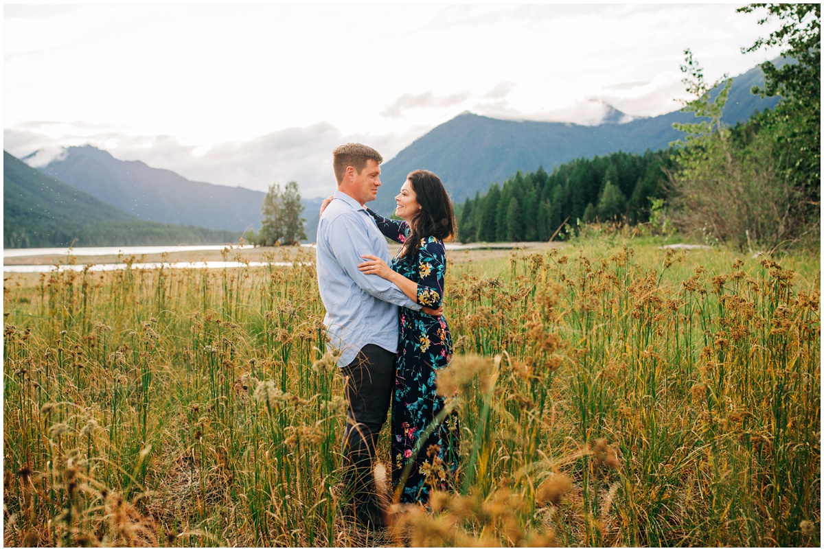 woman in floral dress looking at man