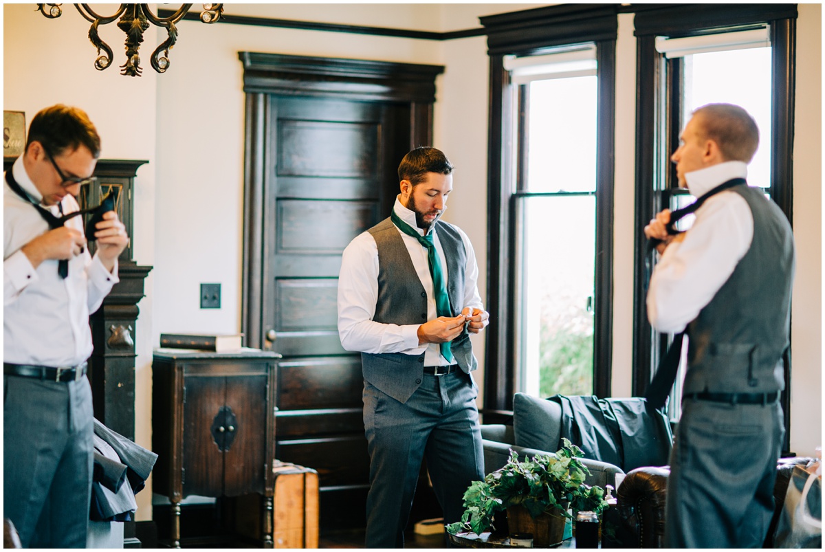 groom getting ready with groomsmen