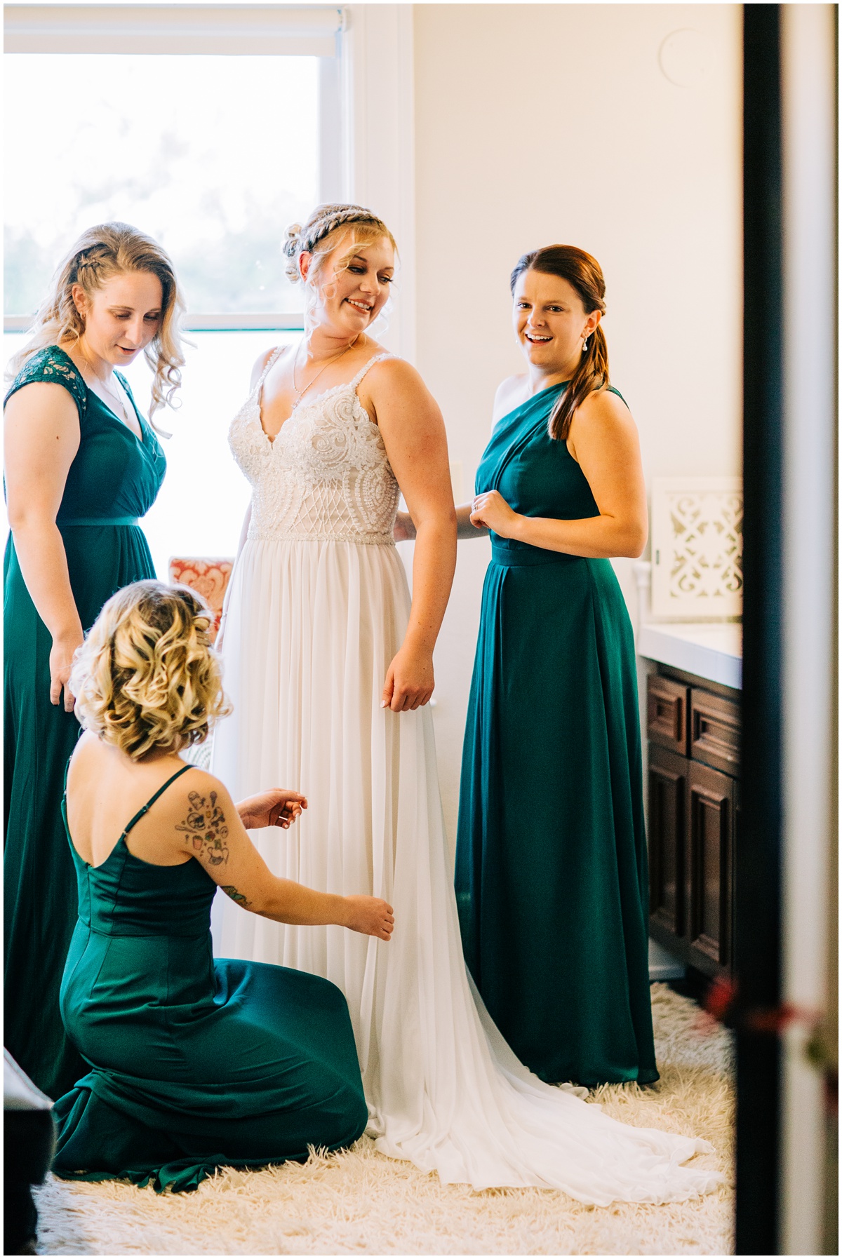 bride getting ready with bridesmaids