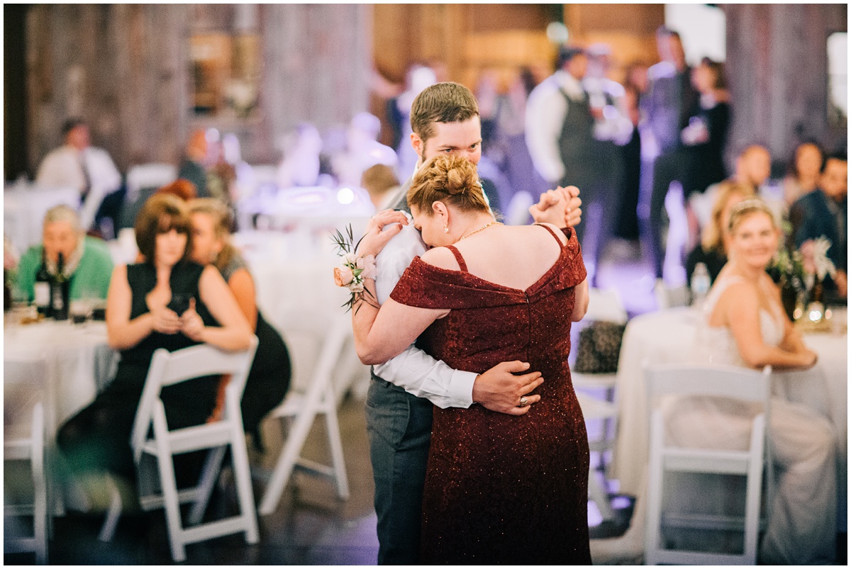 groom and mother dancing mother is crying
