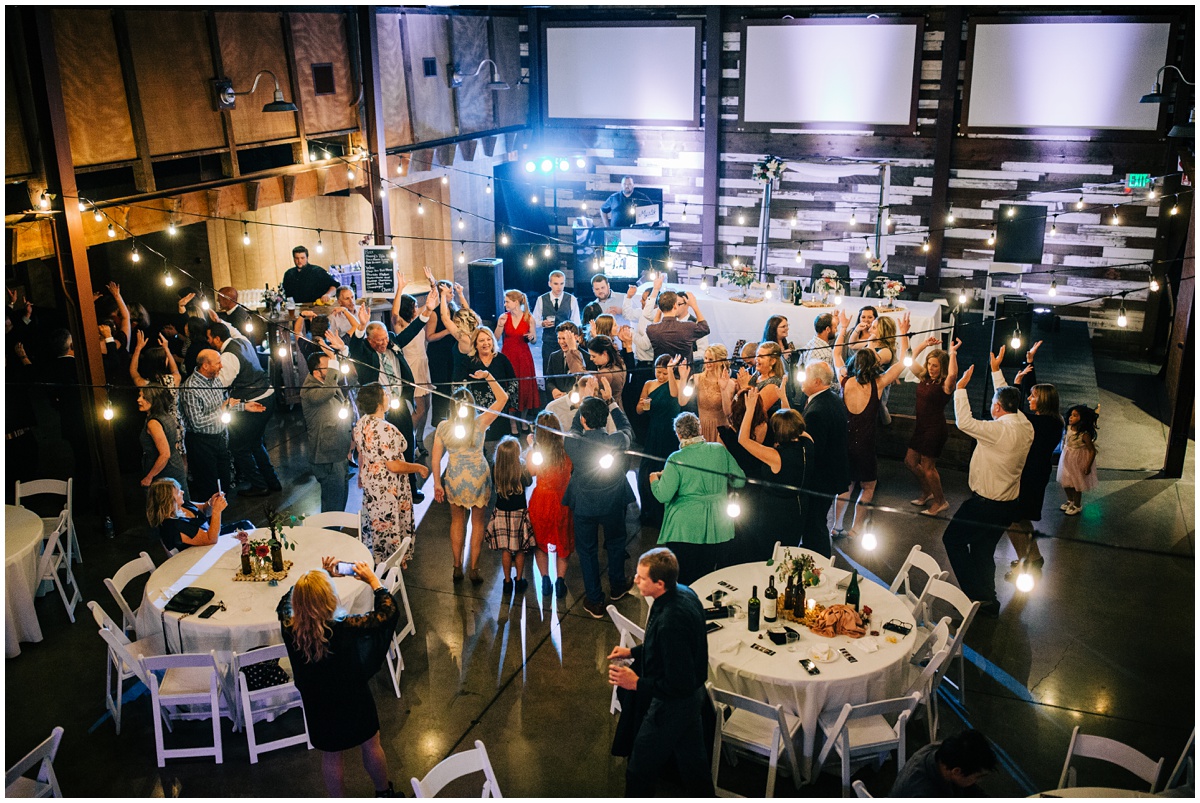 overhead photo of people dancing at wedding reception