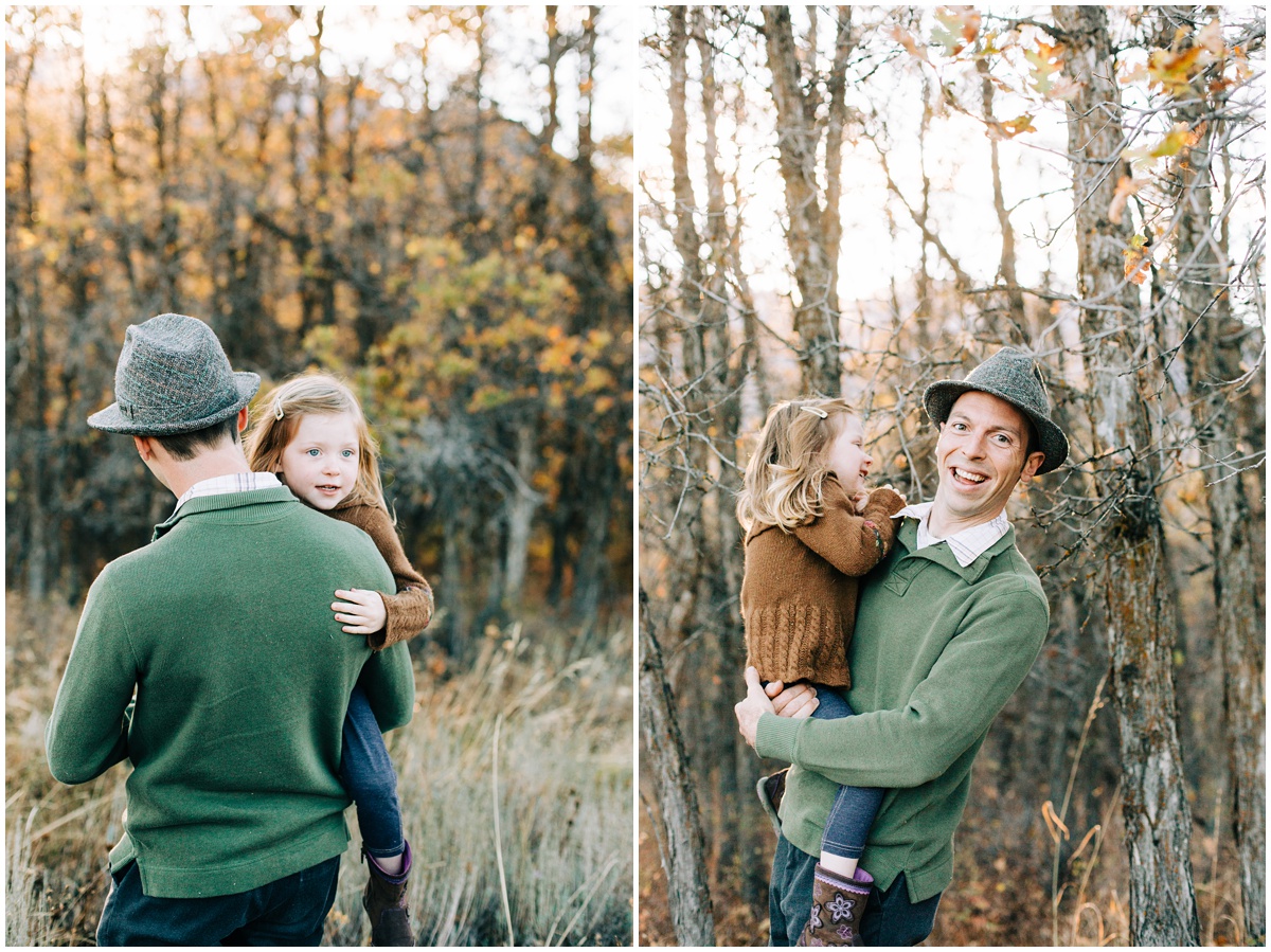 father holding daughter