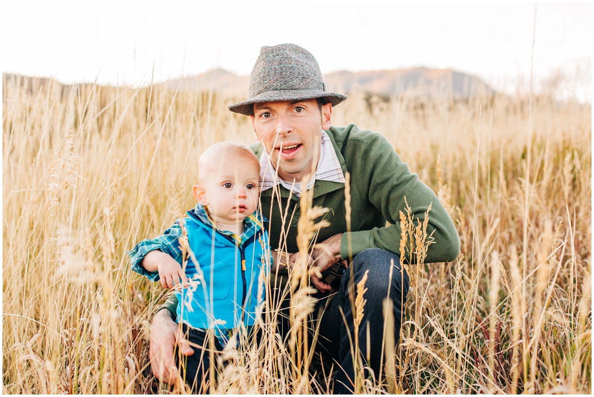 father and son in the tall grass