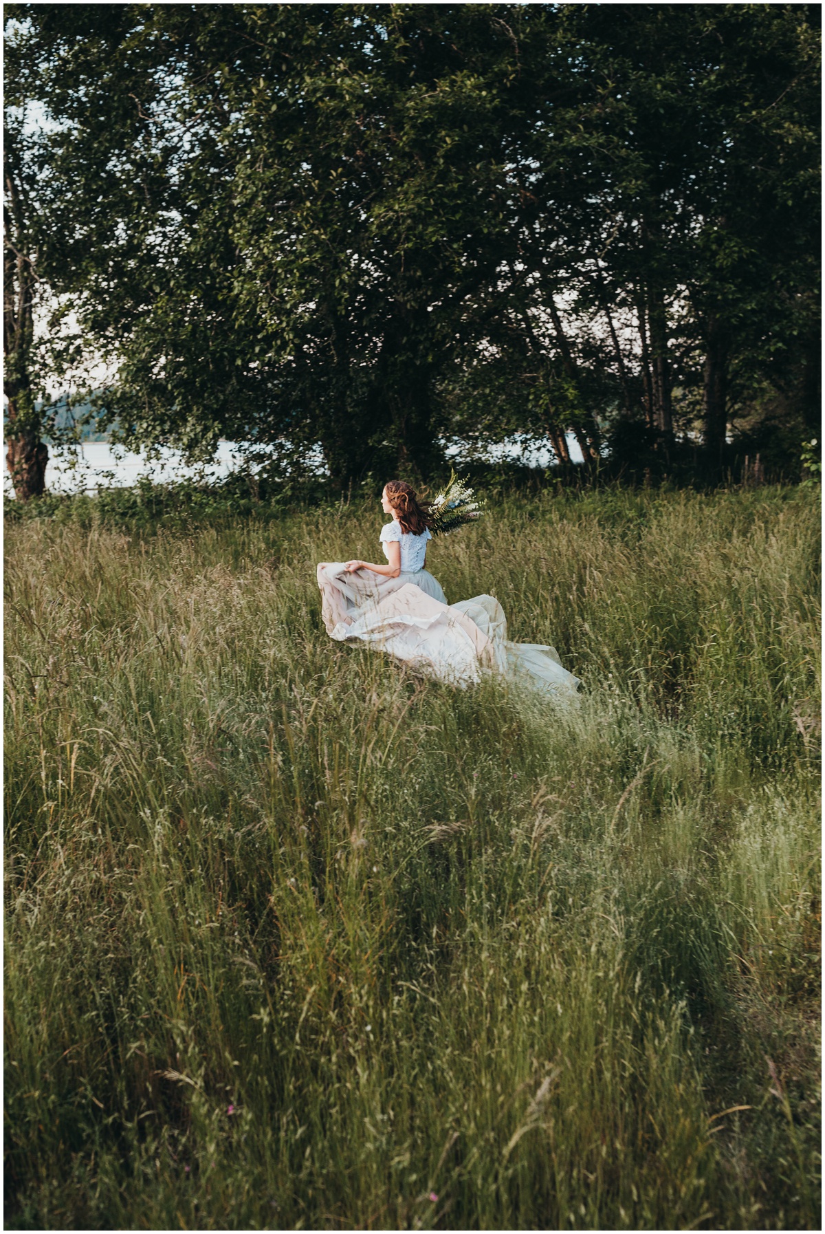 bride running through grass