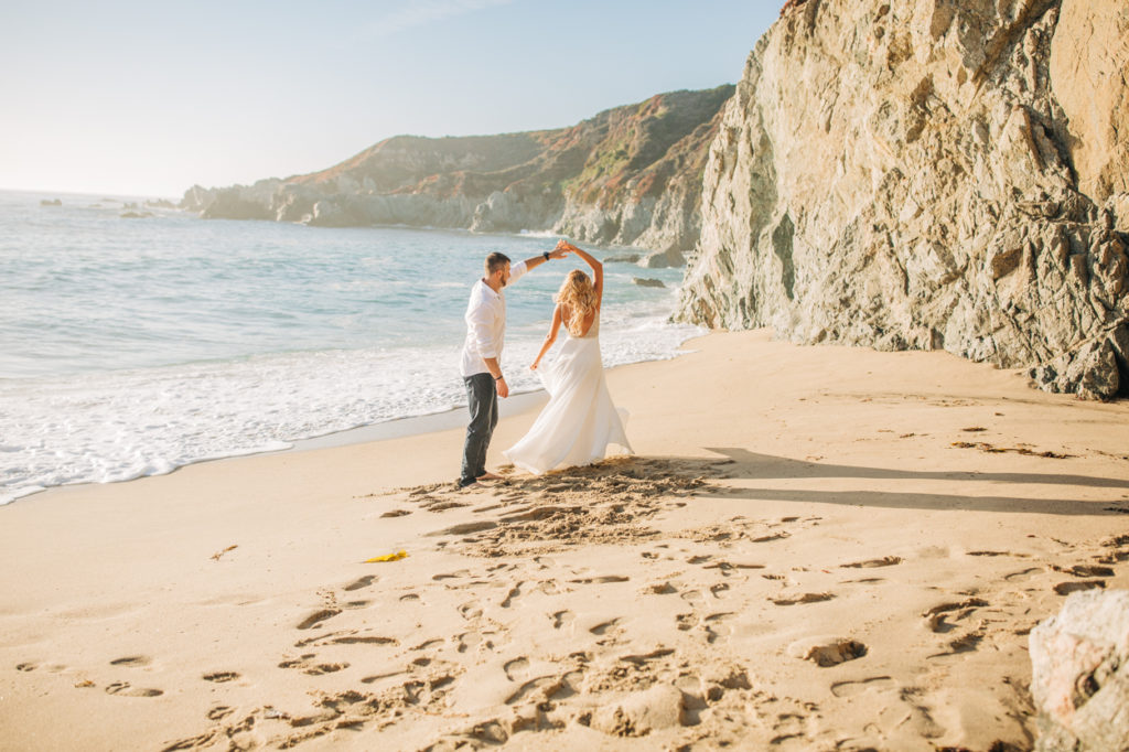 couple dancing on the beach