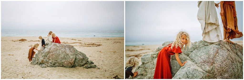 curly hair girls playing on rocks at garapata beach