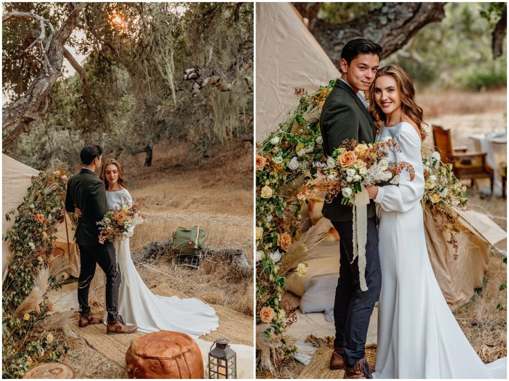 couple standing by boho floral arrangement