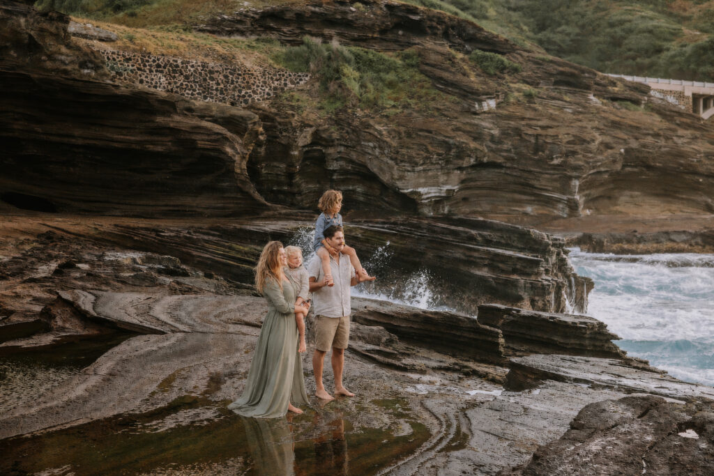 family wearing sage, dusty-blue, cream and tan