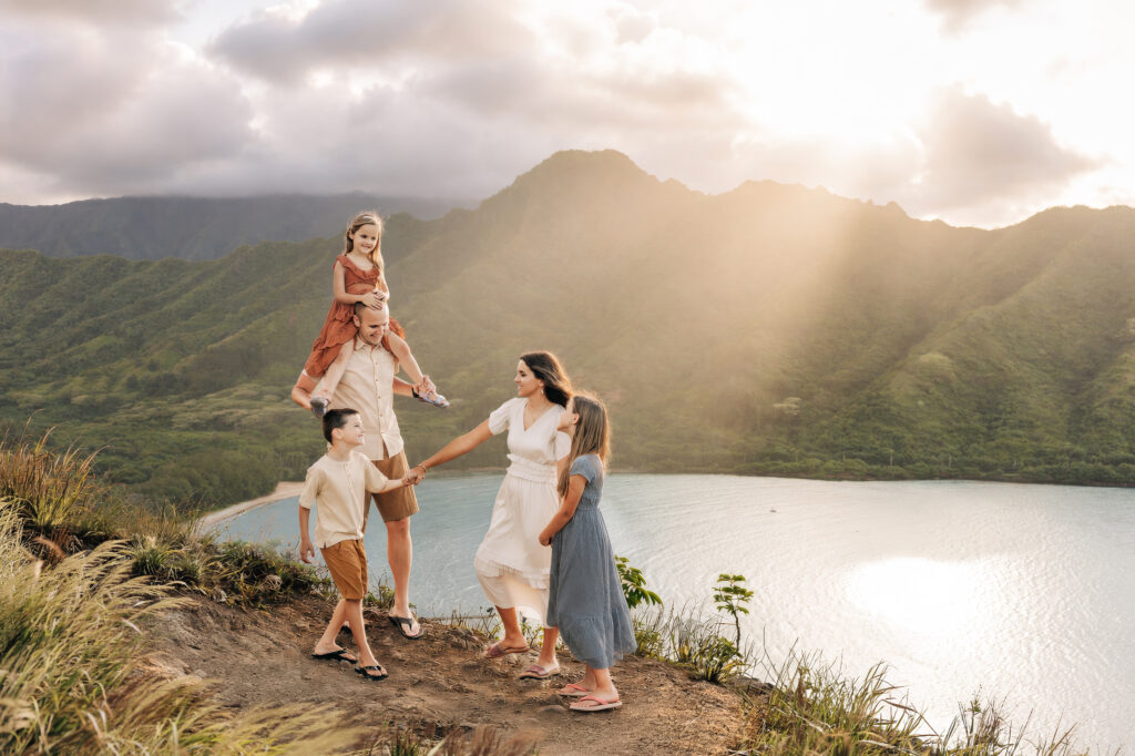 family wearing cream, terracotta, dusty-blue, tan in Hawaii mountains